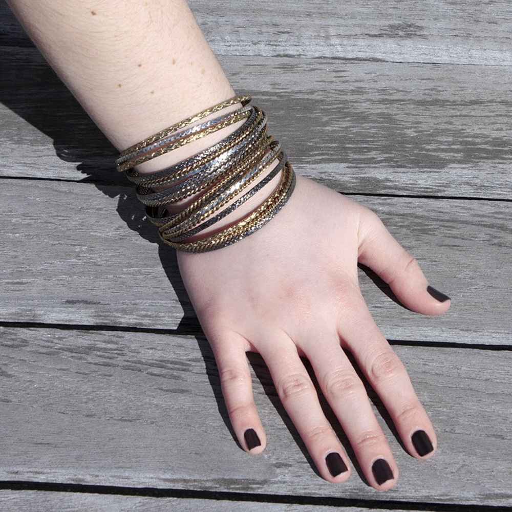 Amrita Singh Silver/Gold Bangles Set.
